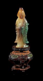 * A Carved Agate Figure of Guanyin Height 3 1/2 inches.
