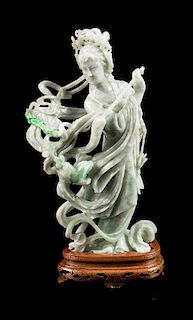 * An Apple Green and Pale Celadon Jadeite Figure of a Female Immortal Height 10 inches.