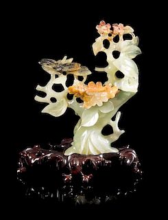 * A Serpentine Carving of a Flowering Tree Height 6 1/4 inches.