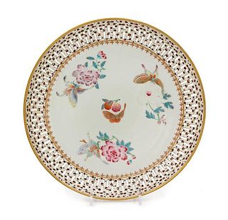 A Chinese Export Famille Rose Reticulated Porcelain Plate Diameter 9 7/8 inches.