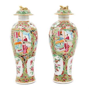* A Pair of Chinese Export Rose Medallion Porcelain Covered Vases Height of each 12 1/4 inches.