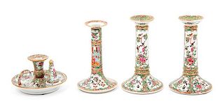 * Four Chinese Export Canton Famille Rose Porcelain Candlesticks Height of tallest 7 1/8 inches.
