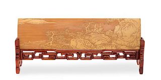 A Carved Bamboo Wrist Rest Length 11 3/4 inches.
