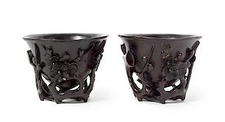 * A Pair of Zitan Libation Cups Each height 3 1/8 inches.