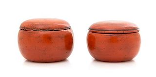 A Pair of Red Lacquered Covered Boxes Diameter of each 4 1/2 inches.