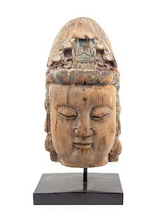 * A Large Carved Wood Head of Guanyin Height 19 1/2 inches.