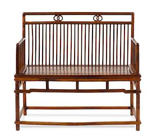 A Huanghuali Bench Height 37 1/2 x length 40 3/4 x width 17 3/4 inches.