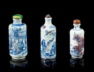 Three Copper-Red, Blue and White Porcelain Snuff Bottles Height of tallest 3 1/4 inches.