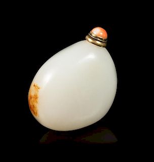 A White and Russet Jade 'Pebble' Snuff Bottle Length 2 inches.