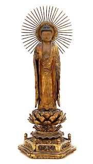 A Japanese Gilt Lacquered Wood Figure of Buddha Height 19 inches.