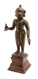 An Indian Bronze Figure Height overall 14 3/4 inches.