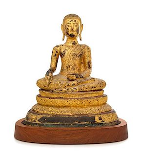A Thai Gilt Bronze Figure of a Monk Height 14 1/2 inches.