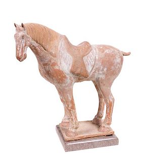 * A Chinese Painted Pottery Figure of a Horse Height 17 inches.