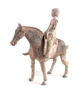* A Rare Chinese Painted Pottery Equestrian Figure Height 16 inches.