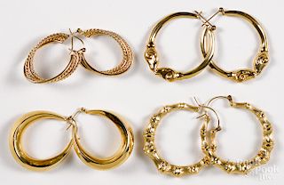 Four pairs of 14K yellow gold hoop earrings