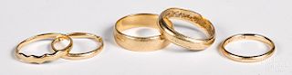 Five 14K yellow gold bands