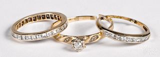 Three 14K yellow gold diamond rings