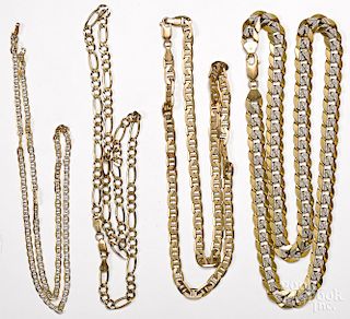 Four 10K yellow gold chains