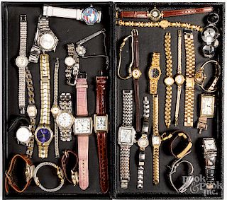 Group of men and women's wristwatches.