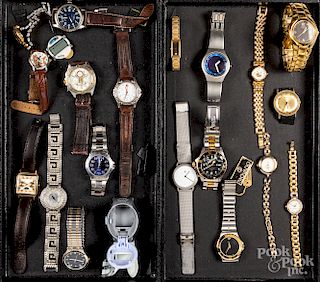 Assorted group of men and women's wristwatches.