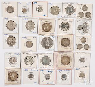 Collection of cased US silver coins.
