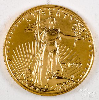 American eagle 1/10 ozt. fine gold coin.