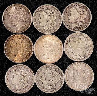 Seven Morgan silver dollars, etc.