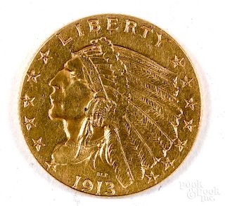 1913 Indian Head two and a half dollar gold coin.