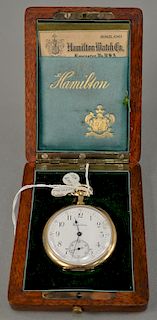 14 karat gold Hamilton open face pocket watch in original wooden Hamilton box with original paperwork. 46.3 mm