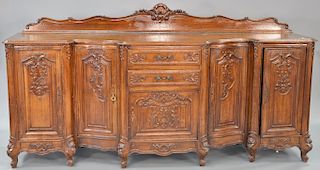 Louis XV style oak sideboard with doors and drawers. ht. 40 in. with back, top: 24" x 98" Provenance: From an estate in Lloyd Harbor...