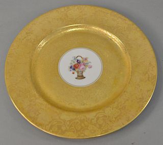 Set of twelve Bavarian Heinrich gilt service plates, large gold band around basket of flowers, sold by Stouffer Studio. dia. 11 in.