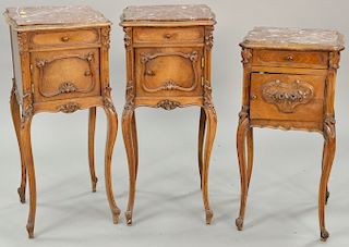 Three marble top humidor cabinets (two marbles are as is). ht. 30 in., top: 14 1/2" x 15" Provenance: From an estate in Lloyd Harbor...