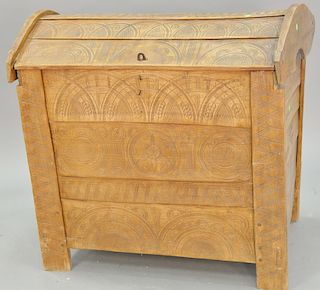 Carved lift top chest. ht. 38 in., wd. 40 in.