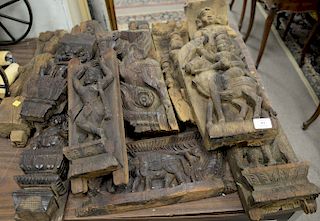 Group of carved wood figural plaques parts architectural pieces. ht. 14 1/2 in. to 19 1/2 in. Provenance: From an estate in Lloyd Ha...