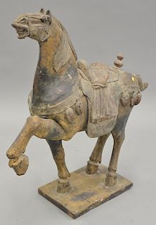 Carved wooden horse, ht. 41 in., lg. 41 in.