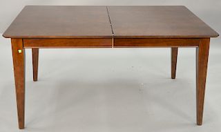 Contemporary Cherry dining table with two side chairs. ht. 29 in., top: 42" x 60"