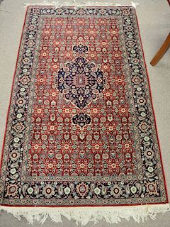 Two Oriental throw rugs. 3' x 5'3" Provenance: Estate of Stephen M. Serlin of Lake George, New York