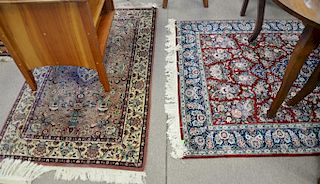 Two Oriental throw rugs. 3' x 5' and 4' x 6' Provenance: Estate of Stephen M. Serlin of Lake George, New York