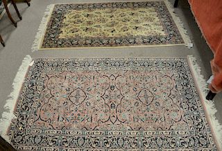 Two Oriental throw rugs. 3' x 5' each. Provenance: Estate of Stephen M. Serlin of Lake George, New York