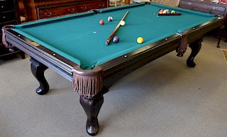 Olhausen 8ft. slate top pool table with leather pockets, balls, and cues.