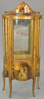 Louis XV style bowed glass curio cabinet with two glass shelves. ht. 62 in., wd. 25 in.