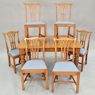 Mahogany dining table with two 17 inch leaves and six Chippendale style chairs. ht. 28 in., top: 47" x 58"