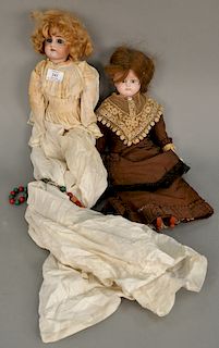 Two dolls including Handwerck German Bisque head doll marked 79 Germany 10 Handwerck and a wax head doll with glass eyes. ht. 19 in....