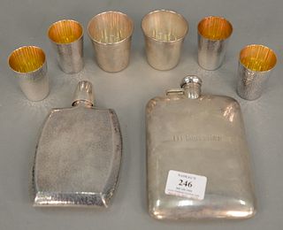 Eight piece sterling silver lot to include two flasks and six cups. 24.2 t oz.