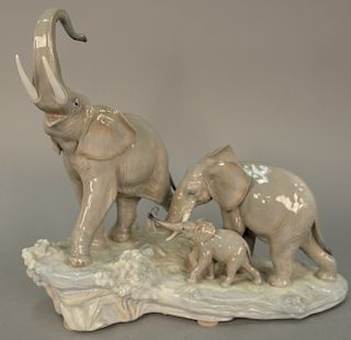 Large Lladro porcelain figural group of three elephants. ht. 14 1/2 in., lg. 16 in.