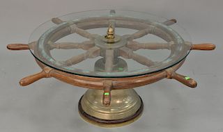 Ship's wheel and brass bell with glass top made into coffee table, ht. 22 in., wheel dia. 97 1/2 in., glass dia. 38 in.