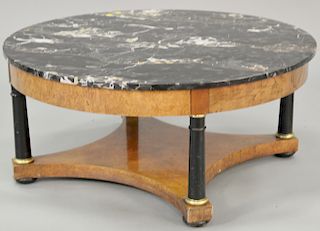 Round mahogany marble top coffee table. ht. 17 in., dia. 38 in.
