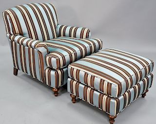 Custom upholstered chair and ottoman.