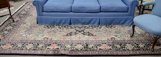 Oriental carpet. 9' x 12'6" Provenance: Estate of Stephen M. Serlin of Lake George, New York
