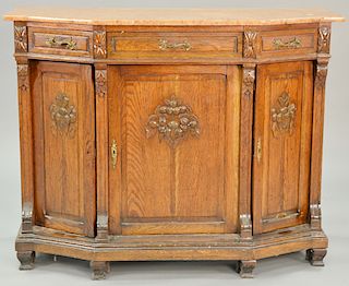 Continental oak sideboard with salmon marble top, 19th century (marble is varnished). ht. 40 in., top: 21 1/2" x 51 1/2" Provenance:...